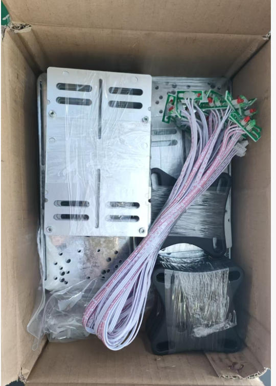 Secure packaging of LED display spare parts, including power supply units and data cables, organized for international shipping