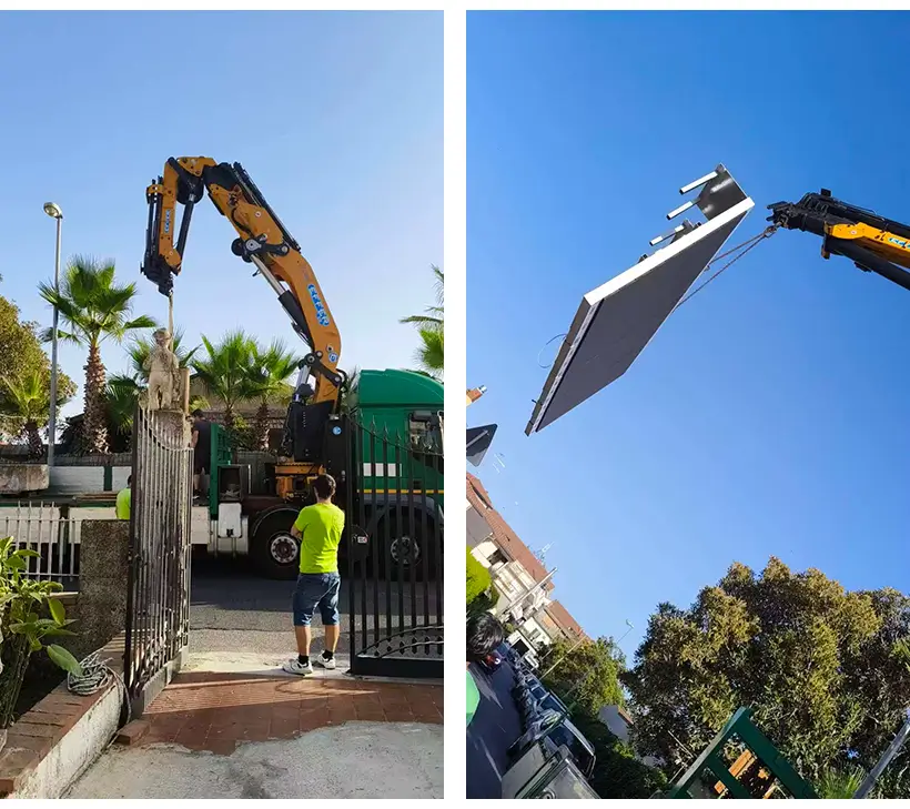 Lifting and mounting massive P6.67 outdoor fixed LED billboard on an Italian retail storefront using a professional crane..webp