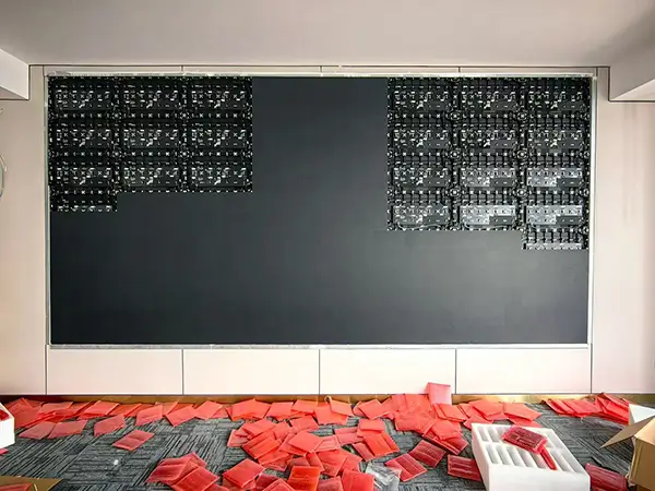 Front access magnetic LED module installation for recessed P1.86 video wall.webp