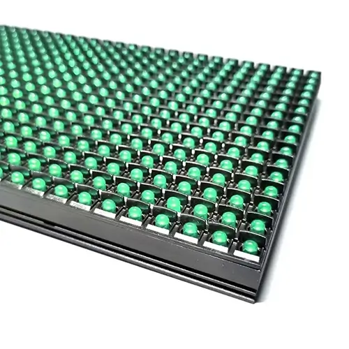 DIP LED module close-up showing individual green LED lamps mounted in through-hole package.webp