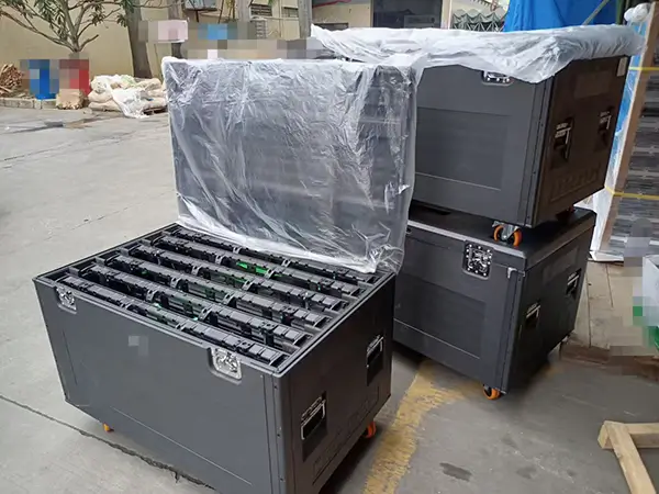 packing rental led display cabinets inside flight case with wheels.webp