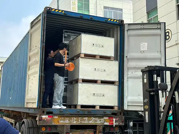 indoor rental LED display flight cases loaded into container for international shipping.webp
